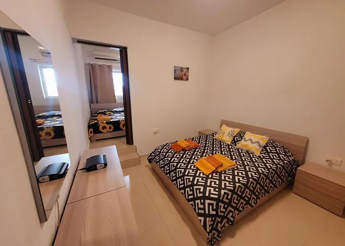 Sunflower Maltese House In