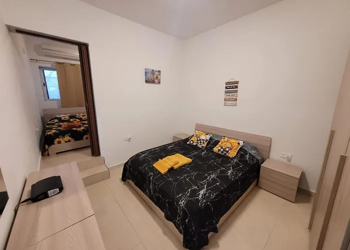 Daire Sunflower Maltese House In *